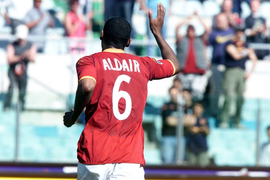 Roma legend Aldair wearing the Giallorossi shirt