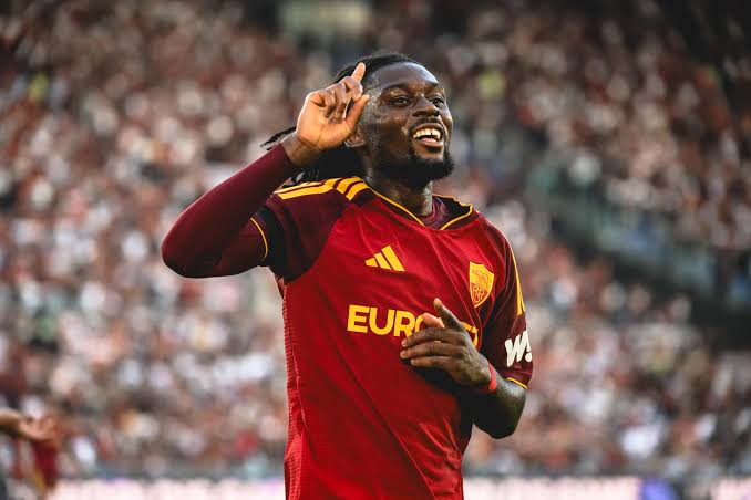 Roma midfielder Manu Koné celebrates scoring against Inter